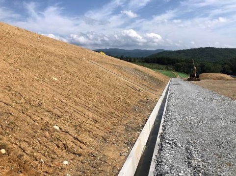 Weed control on slope of solar power plant, Hiroshima (1108)